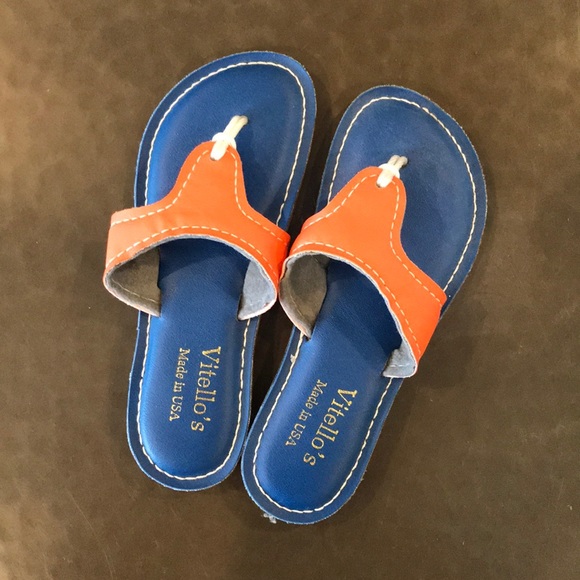 orange and blue flip flops